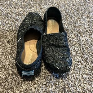 Black Toms with crochet detail